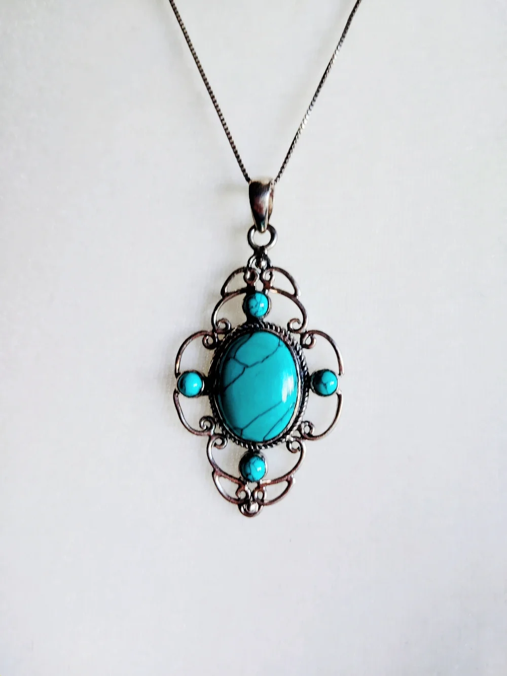 Genuine Turquoise Oval Pendant in Silver Plated  Setting